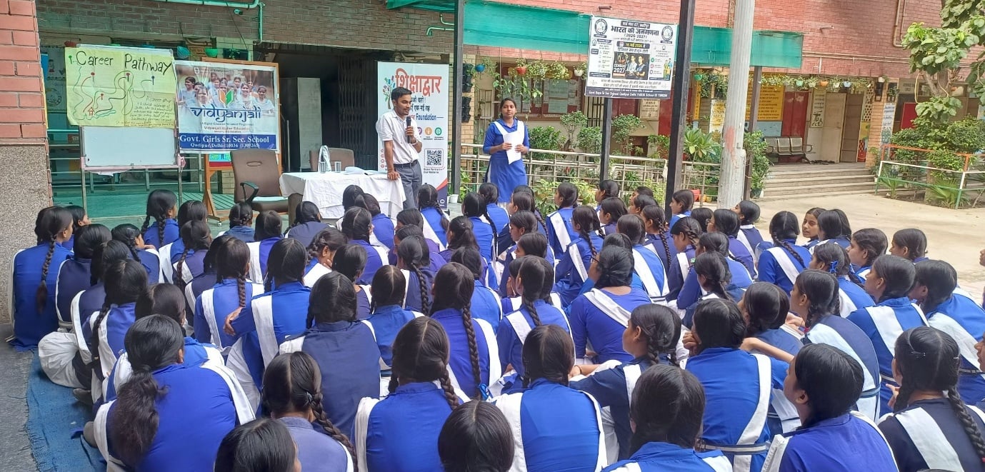 A Shikshadwar volunteer leads a Career Pathway mentorship talk for students at a government girls' school
