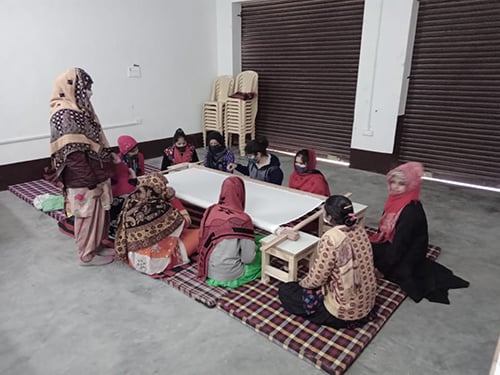 An embroidery skill-training session run by Shikshadwar